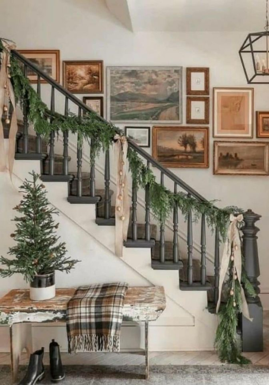 Holiday garland on staircase with gallery wall - AI Design via Whitney Hess (Just Decorate!). #aidesign #aiinteriordesign #aiarchitecture #holidaygarland