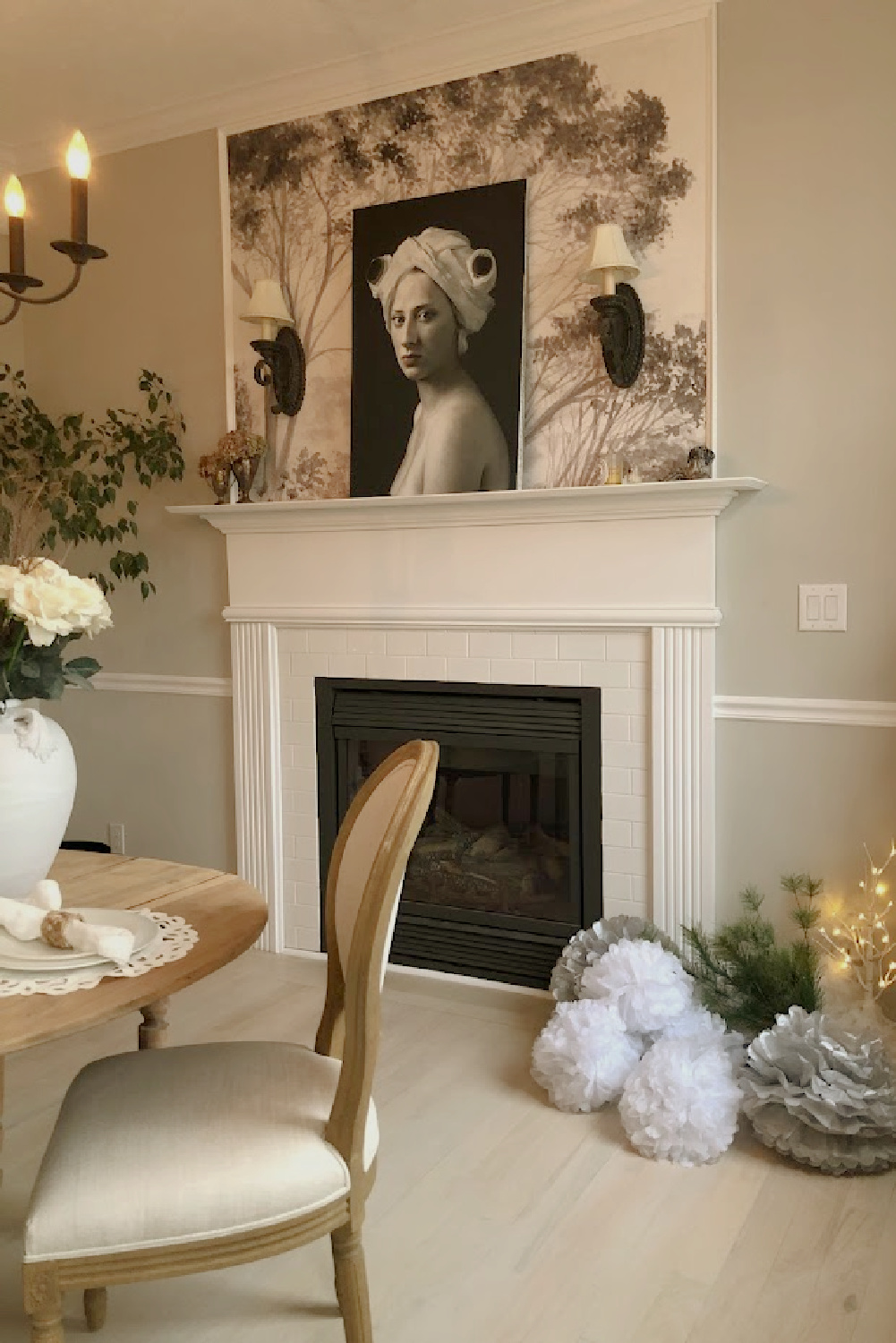 Hello Lovely's serene white holiday decorations in the dining room. #hellolovelyhome
