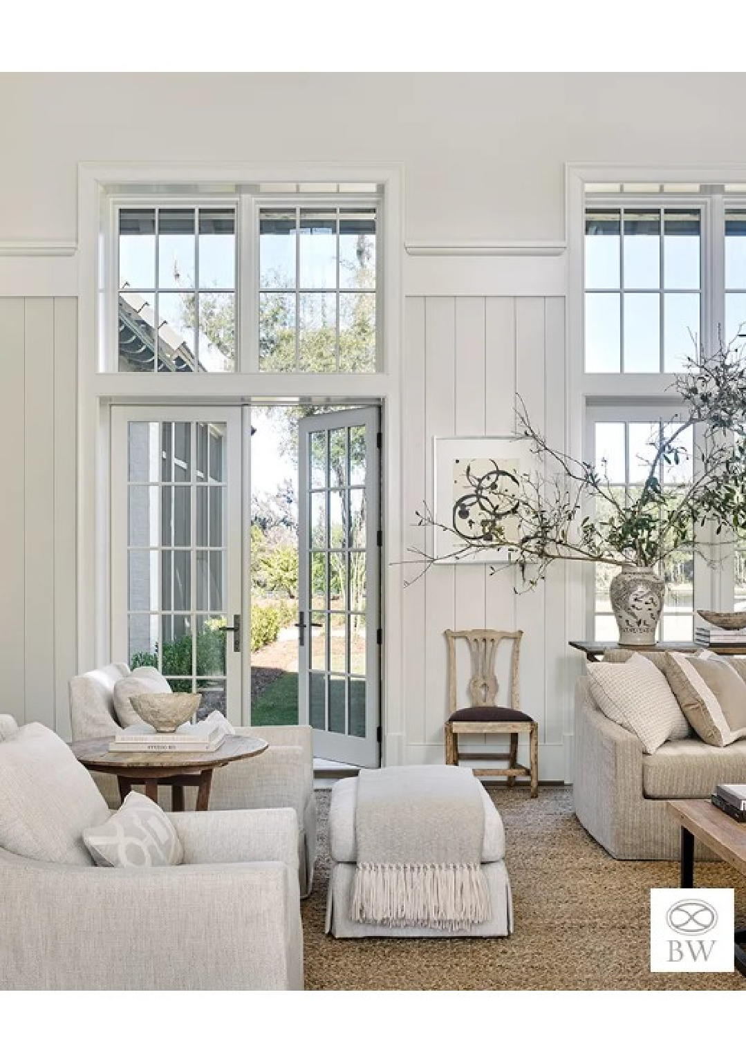 Beautiful living room with English country style and paneled wall design from Beth Webb's Frederica project. #bethwebb #timelessinteriors