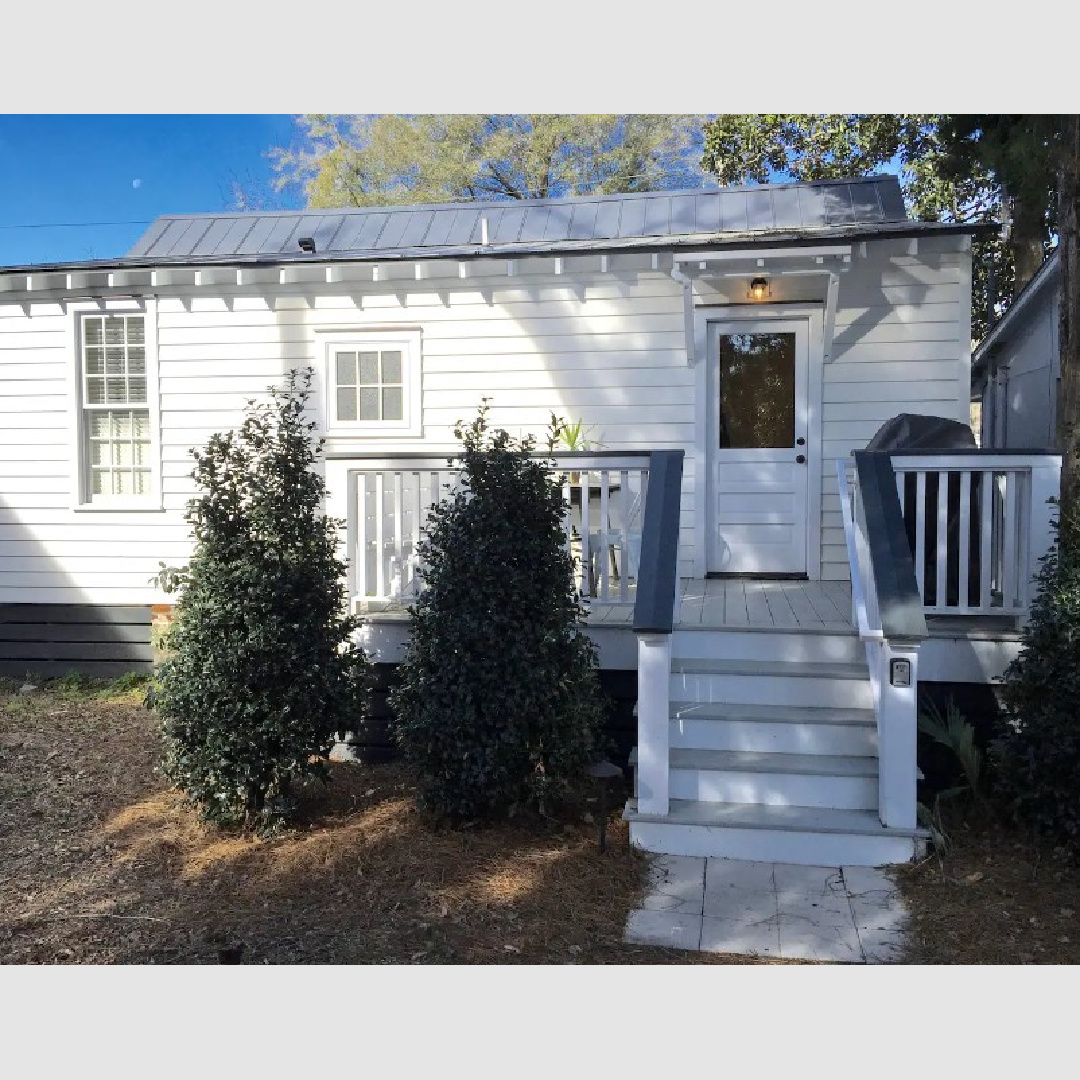 660 sf lowcountry cottage with charming front porch and white interiors in Beaufort, SC - Southern Living. #lowcountrycottage #smallhouseliving #southerncottage