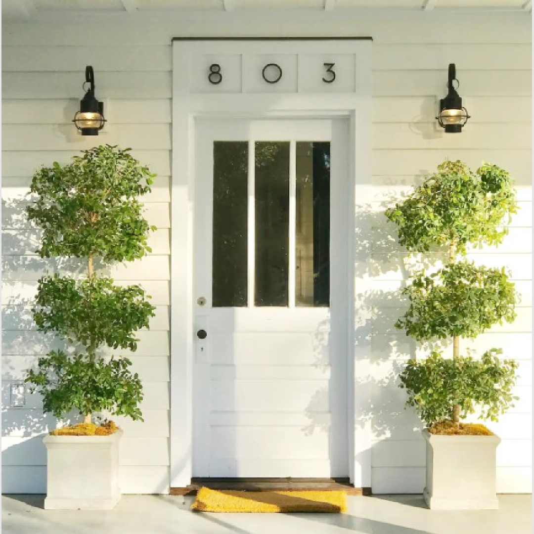 Modern house numbers above front door on a 1889 low country cottage in Beaufort, South Carolina - Southern Living.