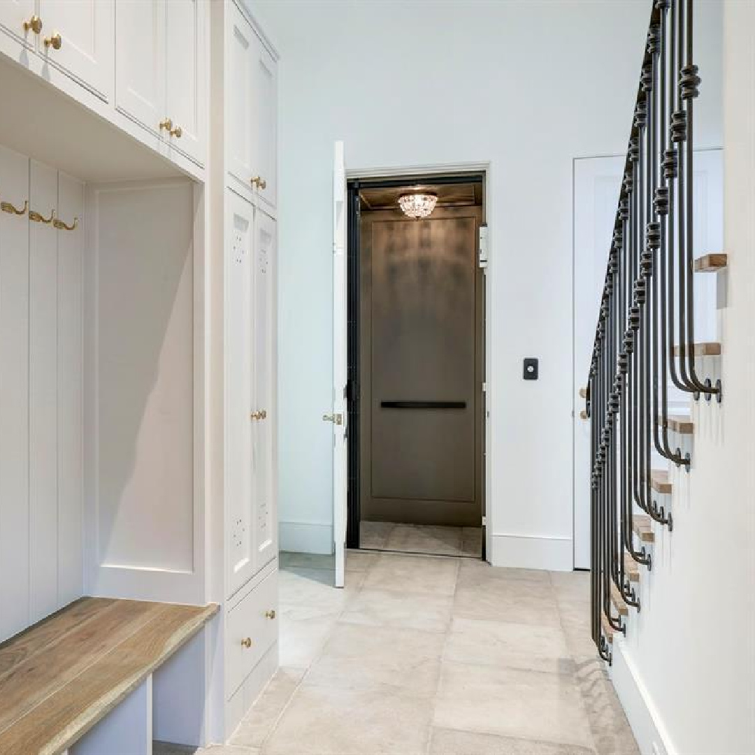 Mudroom and elevator in 2445 Pine Valley Ct., Houston - Jennifer Hamelet of Mirador Builders; European style and interiors with reclaimed materials from Chateau Domingue. #europeanmanor #oldworldstyle
