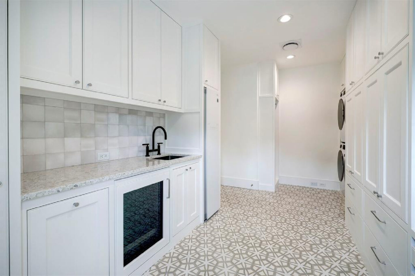 Laundry room in 2445 Pine Valley Ct., Houston - Jennifer Hamelet of Mirador Builders; European style and interiors with reclaimed materials from Chateau Domingue. #europeanmanor #oldworldstyle