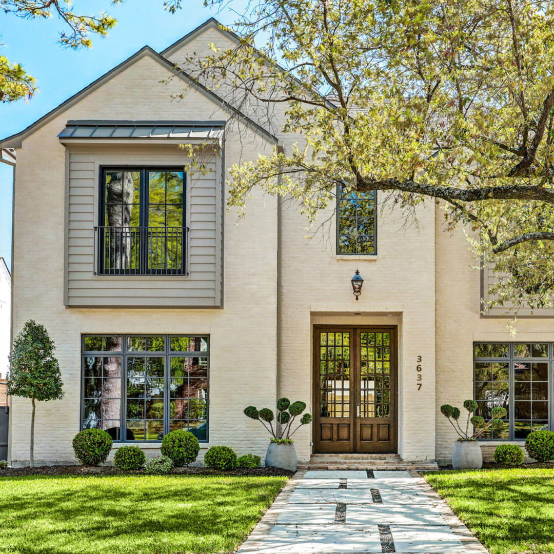 Facade of 3637 Meadow Lake, Houston home by Elron with Chateau Domingue finishes, flooring, and paneled library by Segreto Finishes. #oldworldstyle #europeanarchitecture #houstonhomes