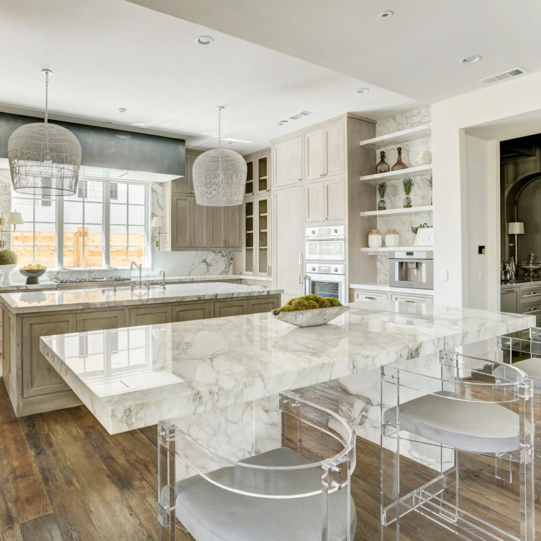 Bespoke kitchen with antique oak floors at 3637 Meadow Lake, Houston home by Elron with Chateau Domingue finishes, flooring, and paneled library by Segreto Finishes. #oldworldstyle #europeanarchitecture #houstonhomes