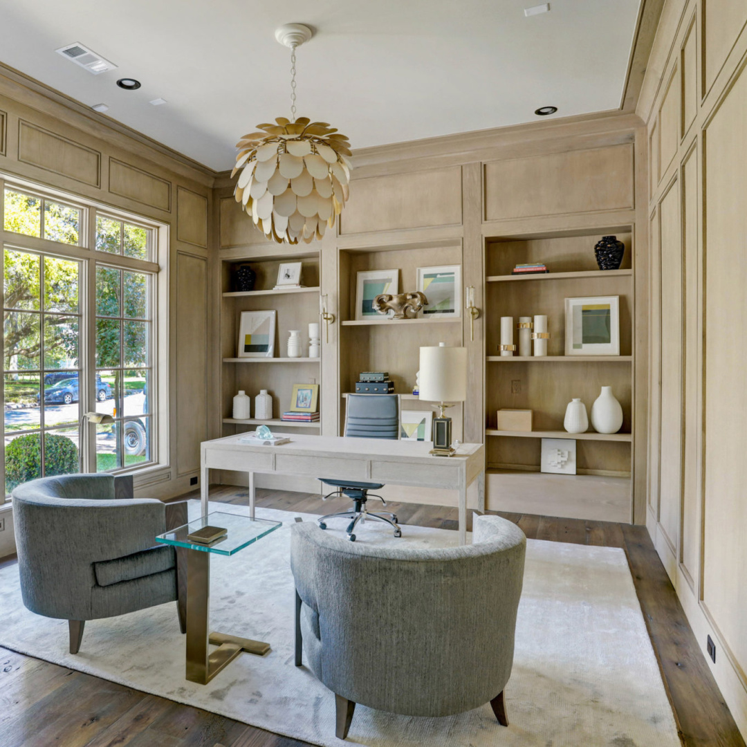 Paneled home library at 3637 Meadow Lake, Houston home by Elron with Chateau Domingue finishes, flooring, and paneled library by Segreto Finishes. #oldworldstyle #europeanarchitecture #houstonhomes