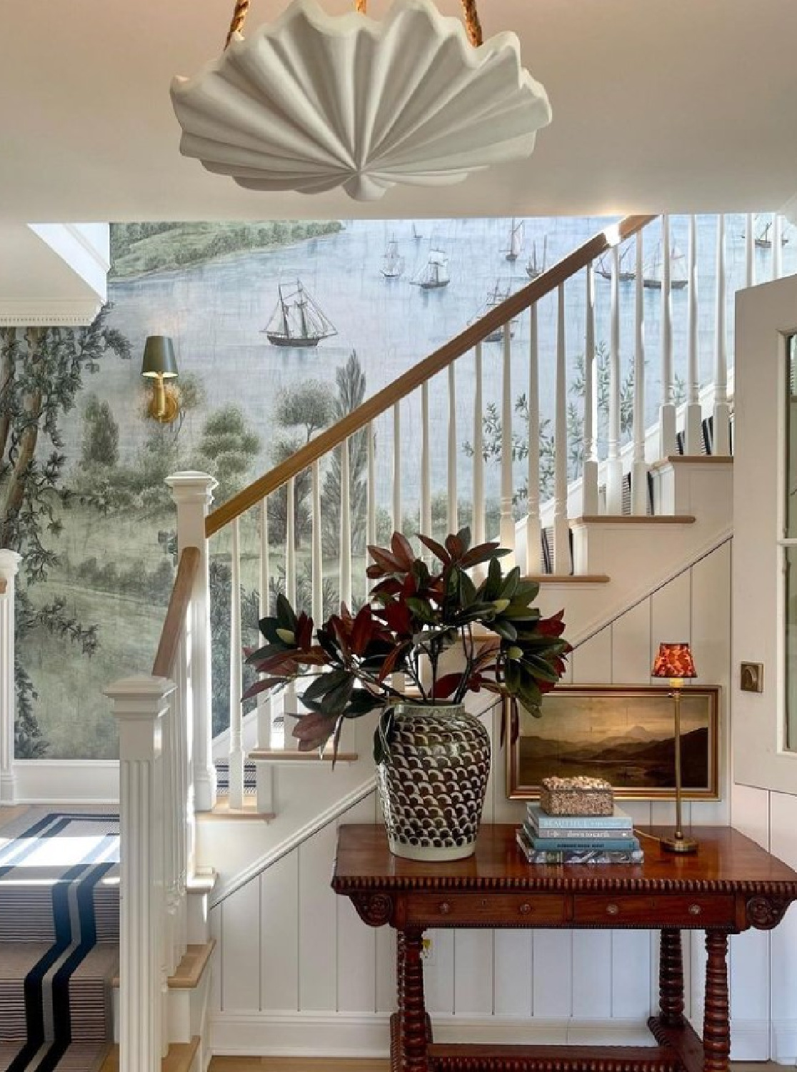 Beautiful entry with staircase and mural in California cottage - @m_m_interior_design. #hamptonsstyle #californiacottage #traditionalstyle