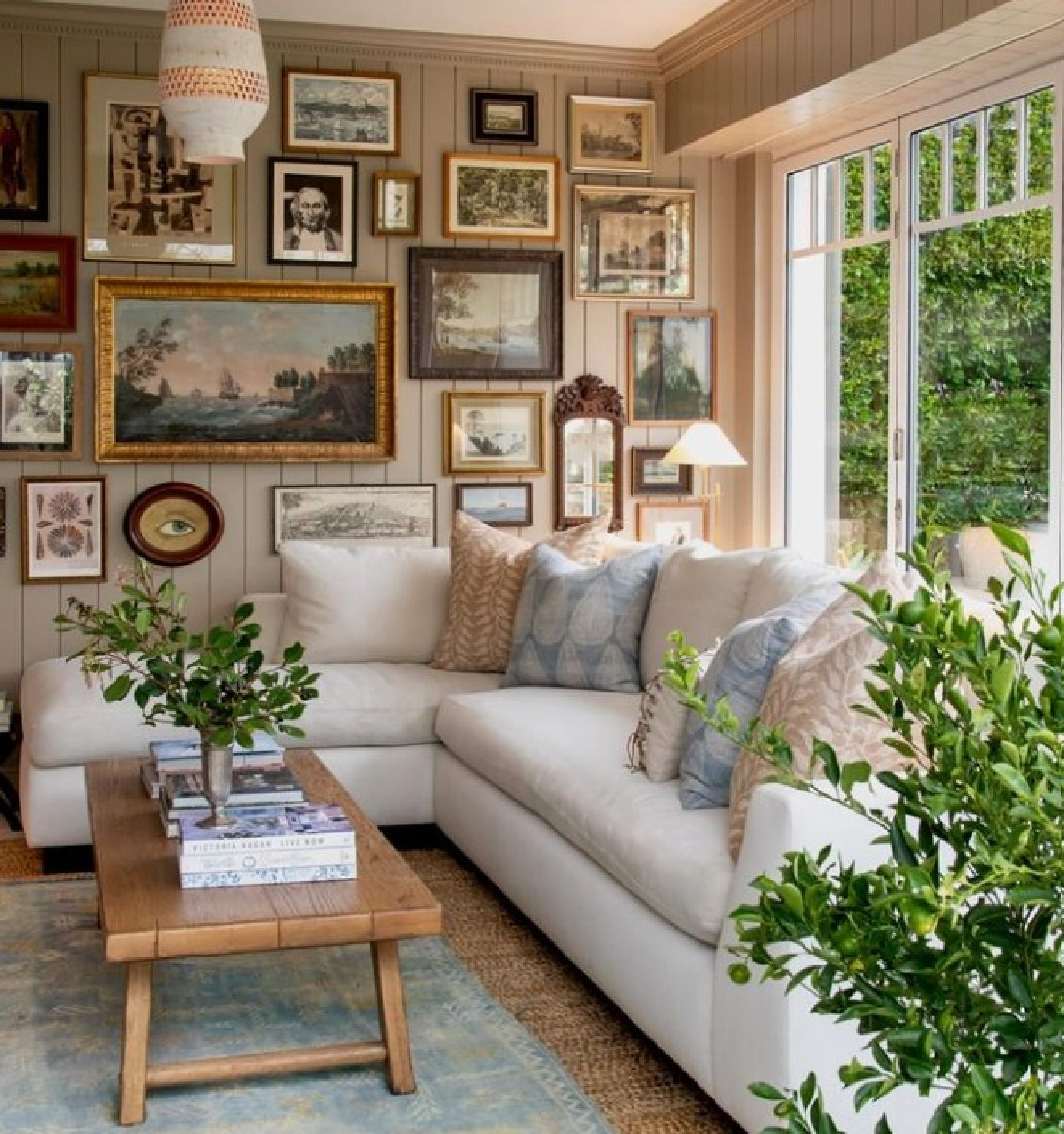 Gallery wall in cottage sun room painted Farrow & Ball Light Gray No. 17 - @m_m_interior_design. #farrowandballlightgray #gallerywall