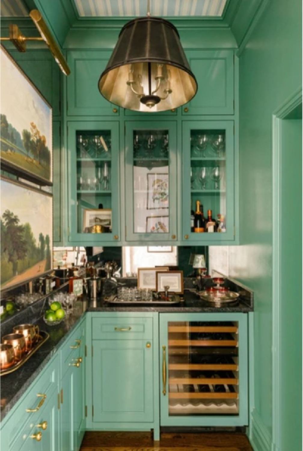 Green cabinetry in a sophisticated Brownstone with design by @m_m_interior_design