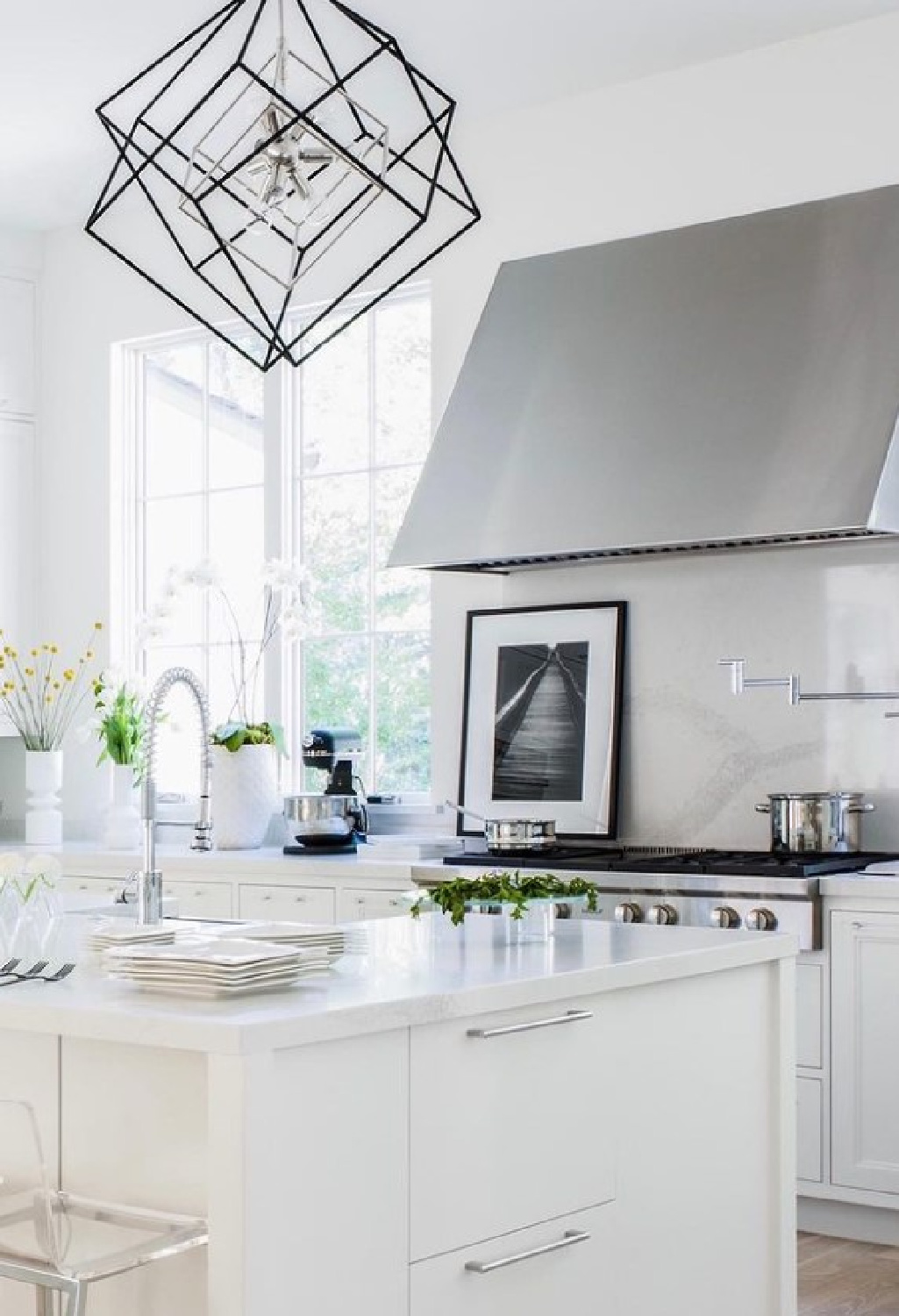 Benjamin Moore White Dove in a lovely modern minimal kitchen by Melanie Davis Design. #benjaminmoorewhitedove