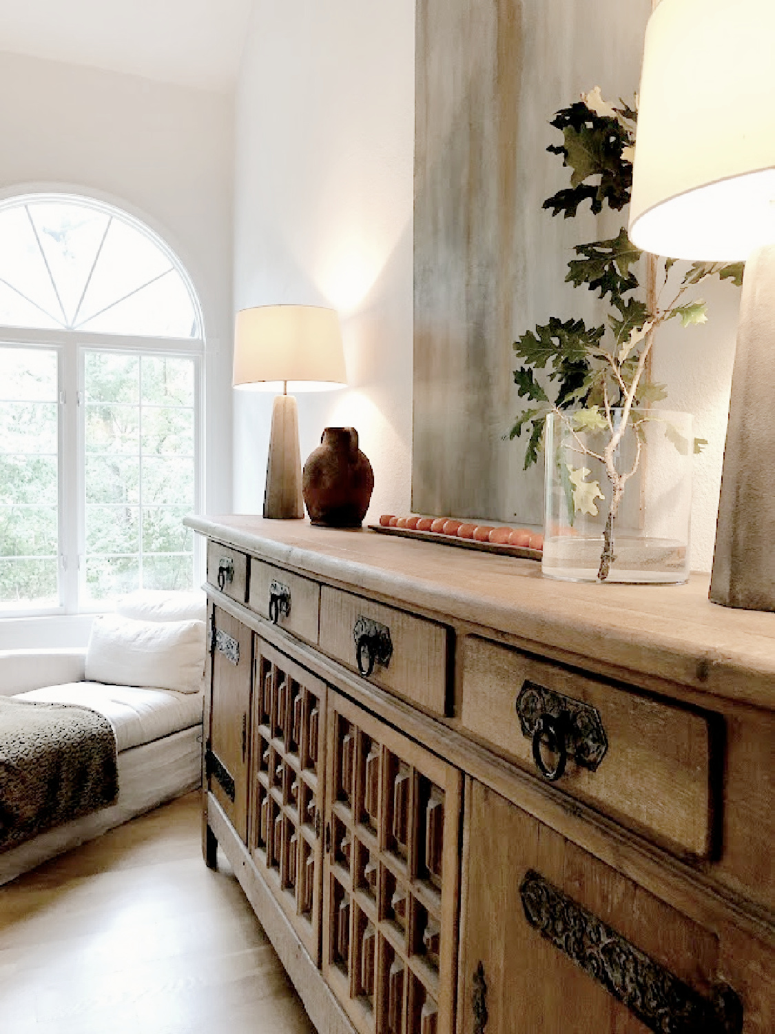 Hello Lovely's modern Belgian sideboard and chaise in living room. #modernbelgian #hellolovelyhome