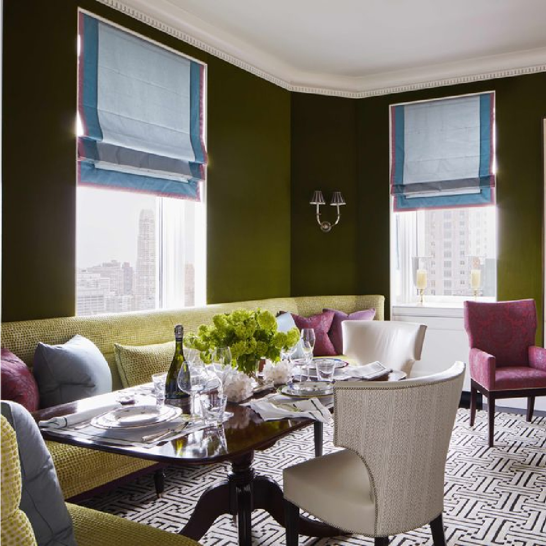 High rise apartment with green, purple, and blue contrast in a Jeffrey Bilhuber designed dining rea with banquette (photo: Thomas Loof) for Veranda.