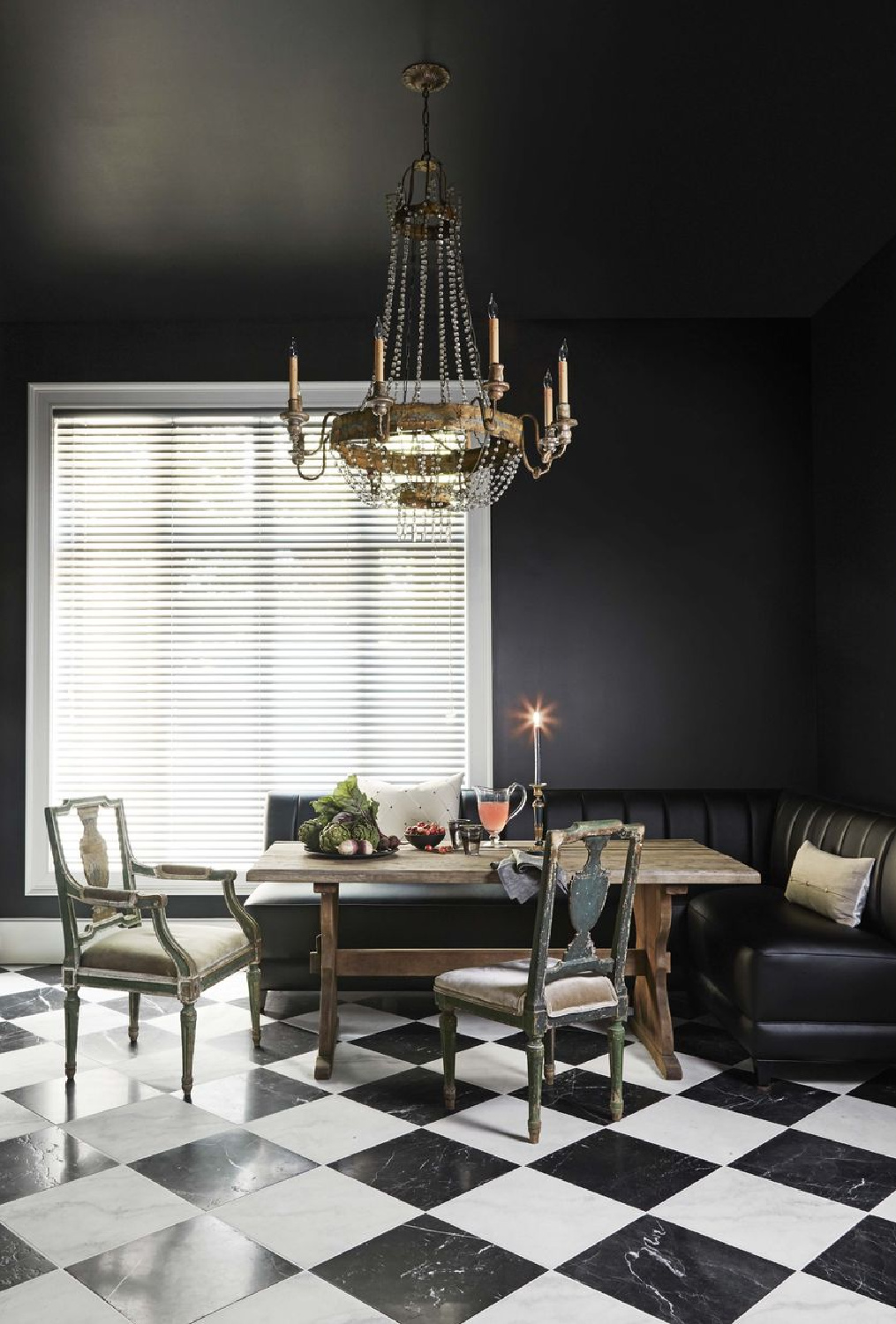Dramatic and pared-back John Oetgen nook with antiques and deco-style banquette (photo: Thomas Loof) - Veranda.