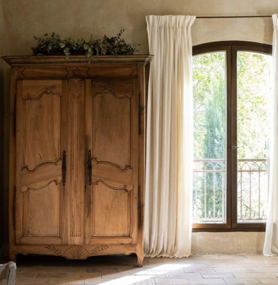Wardrobe in French country bedroom. Warm European luxury and cozy opulence in a French vacation villa in Provence - La Bastide de Laurence. #frenchbastide #frenchvilla #luxuryvilla #provencevilla #warmeuropeanluxury #cozyopulence #provencehomes #frenchcountryinterior