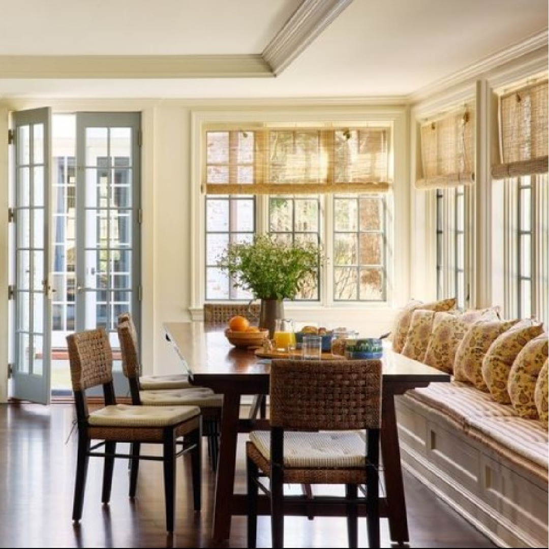 Airy serene yet warm breakfast nook with banquette in a kitchen design by @mcgrath2. #breakfastnook #traditionalkitchen