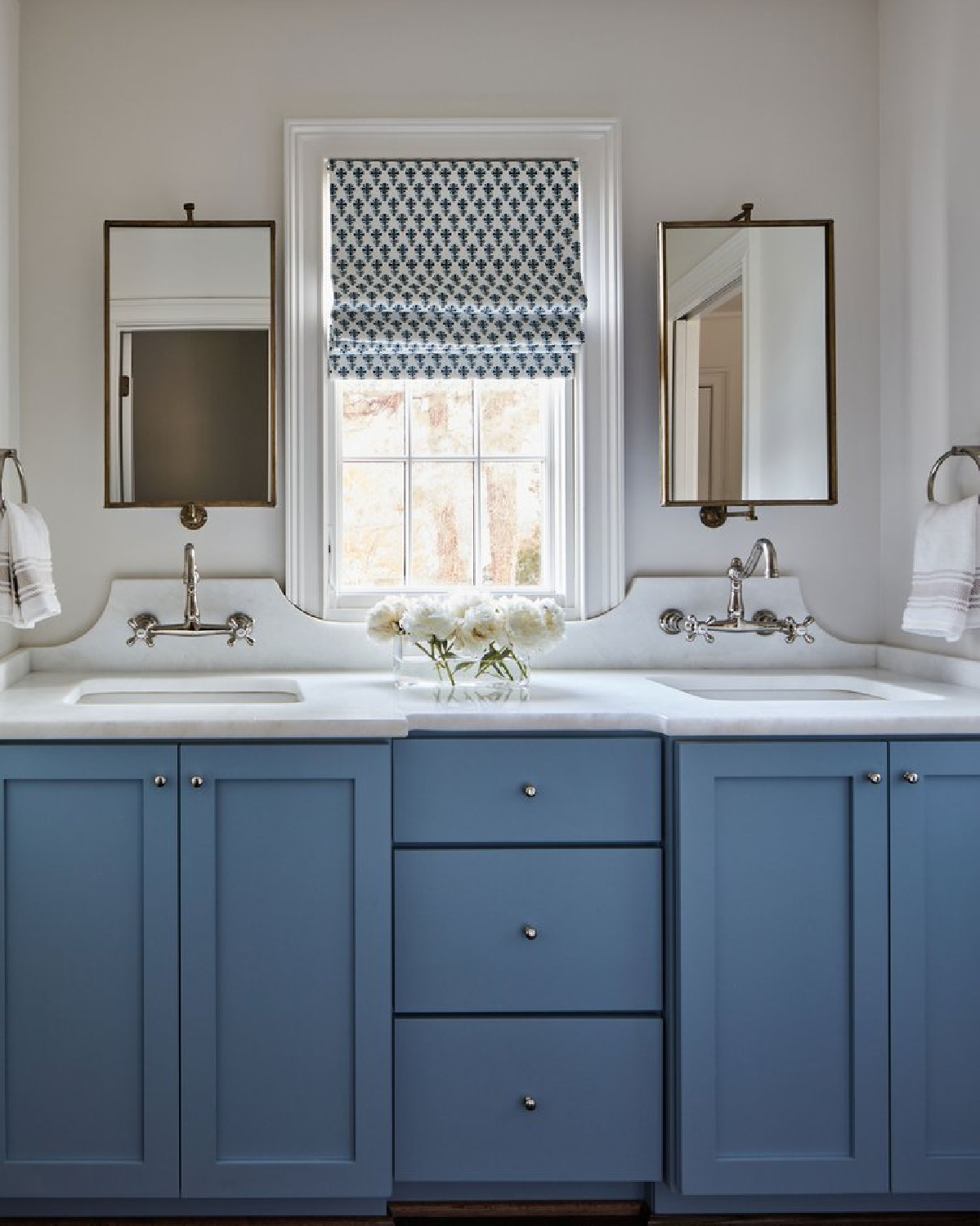 Beautiful blue bath vanity with window in center - @riverbrook_