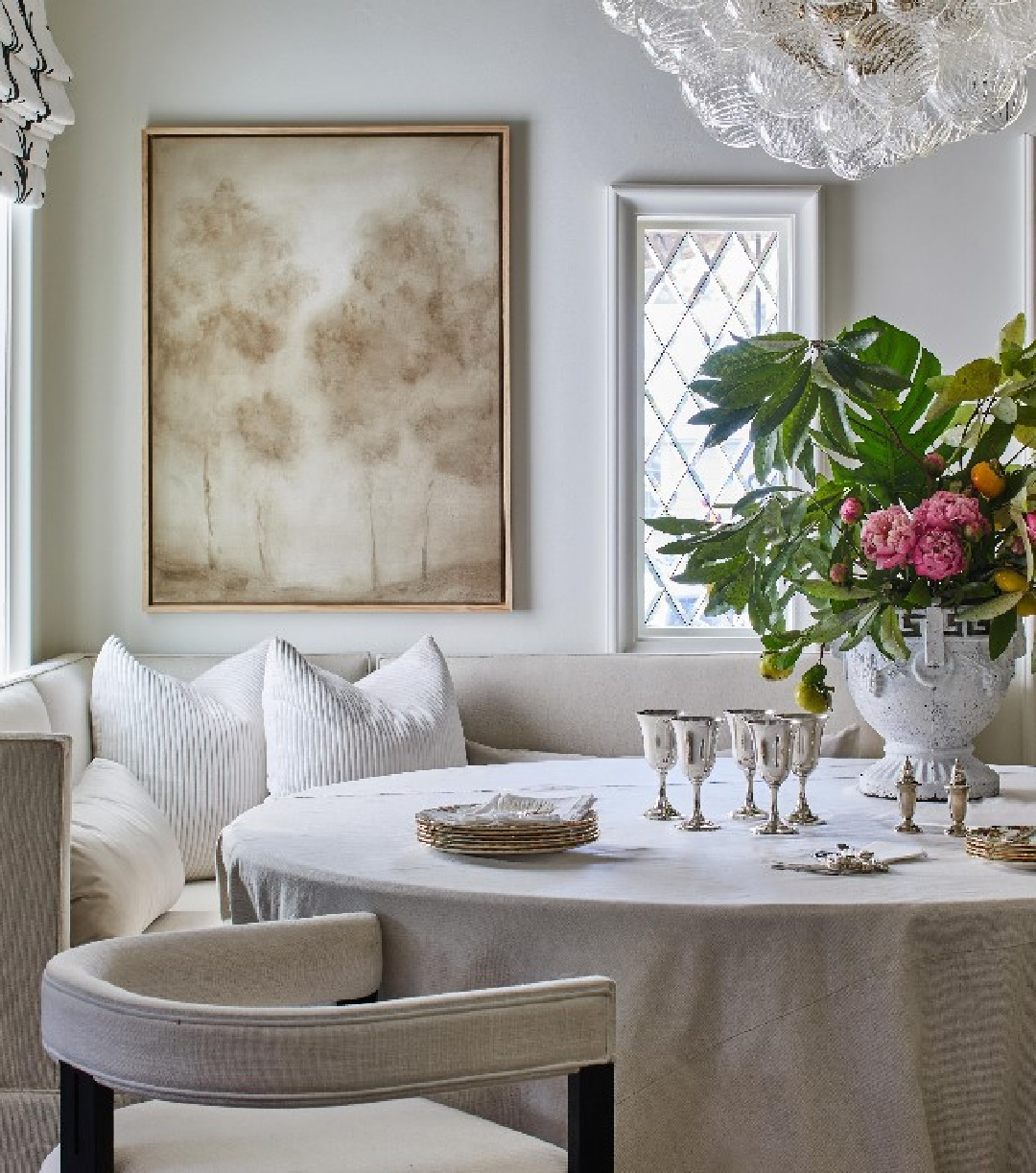 Neutral cozy opulent dining nook with banquette - @riverbrook_