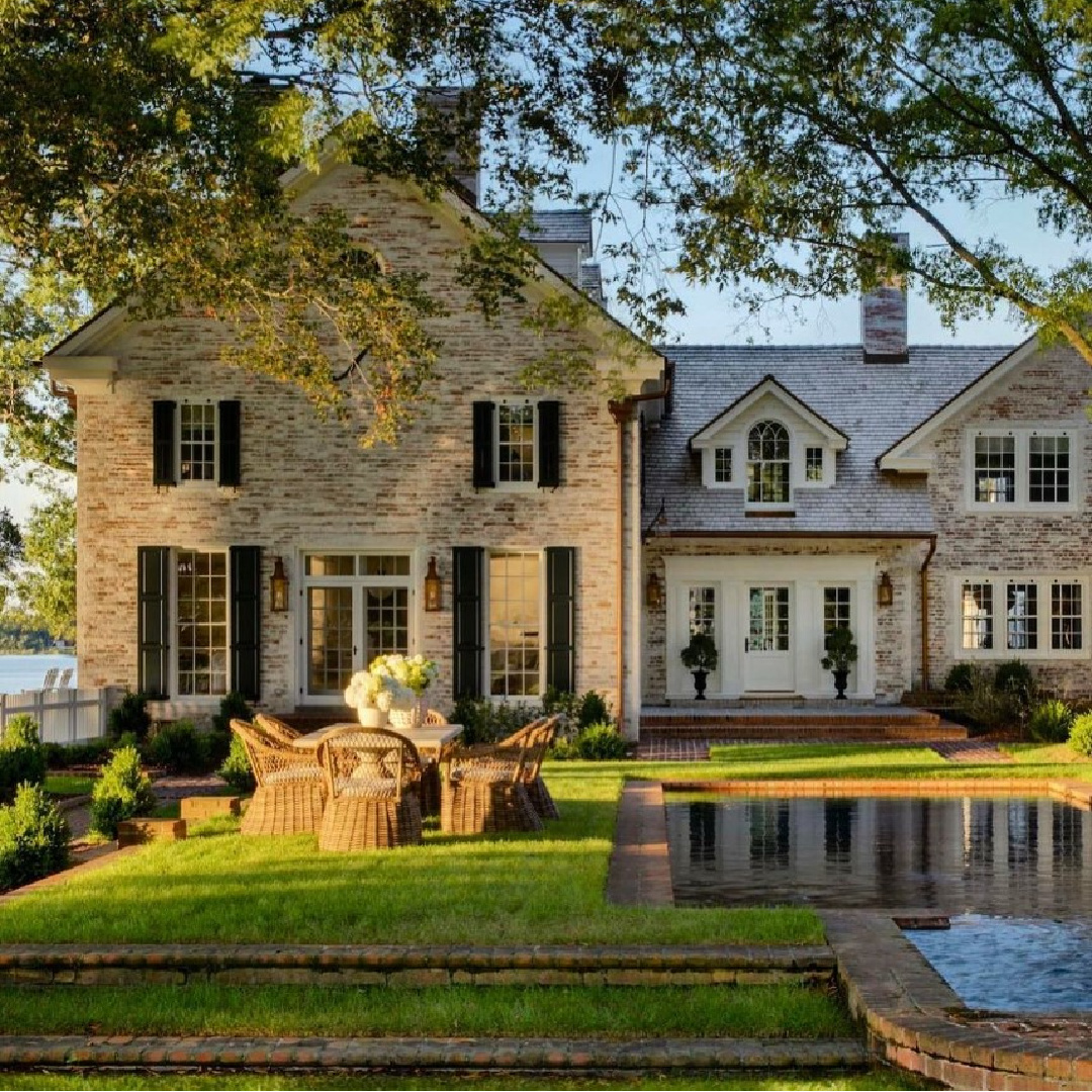 Traditional brick classic house exterior with water feature and lush lawn and garden - @weethhome. #residentialarchitecture #facadelovers