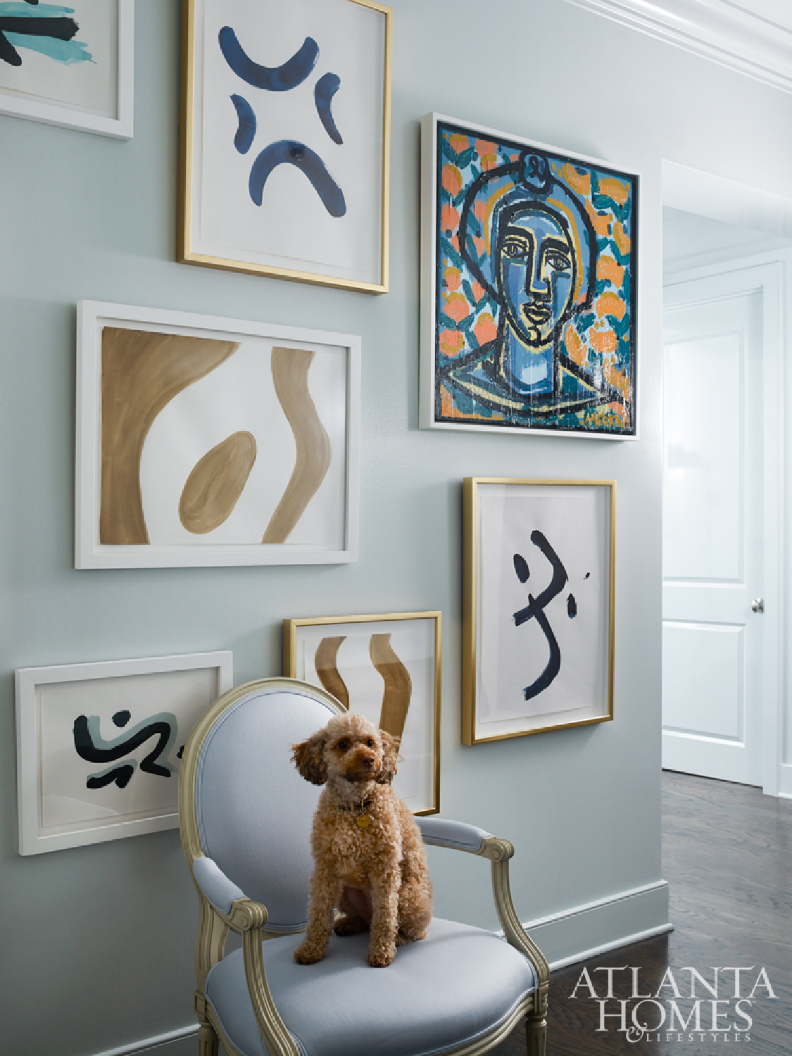 Farrow & Ball Borrowed Light on a gallery wall in an ethereal home with elegant design by Melanie Turner Interiors. #farrowandballborrowedlight #palefrenchblue