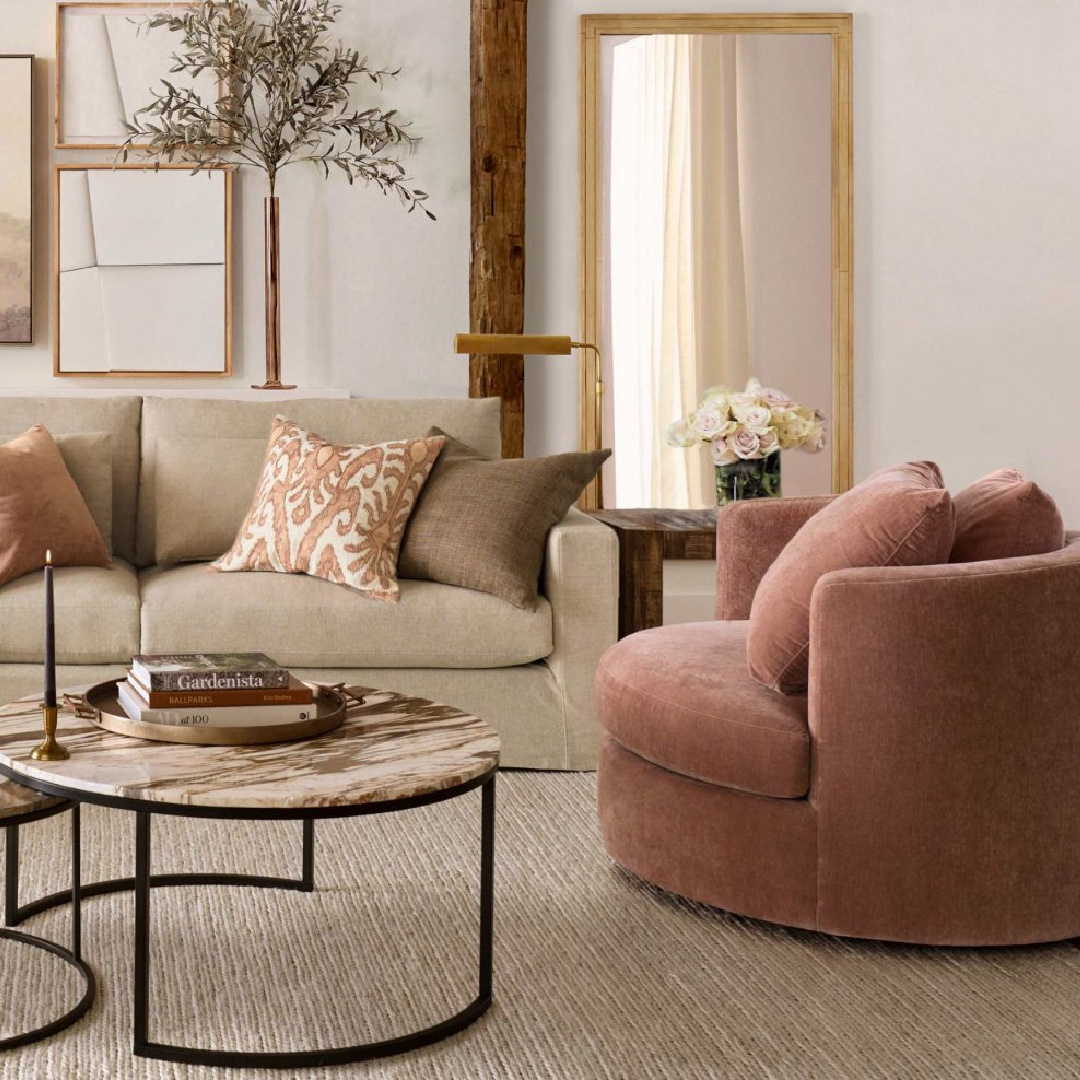 Living room with rose velvet swivel chair, Pottery Barn.