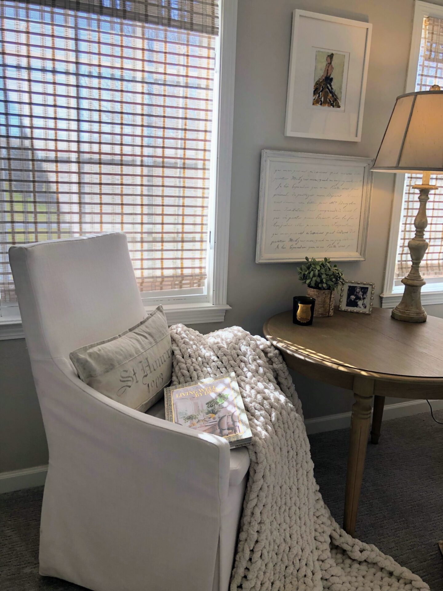 Holly Irwin art in serene bedroom with Belgian style and SW Agreeable Gray Walls - Hello Lovely. #agreeablegray