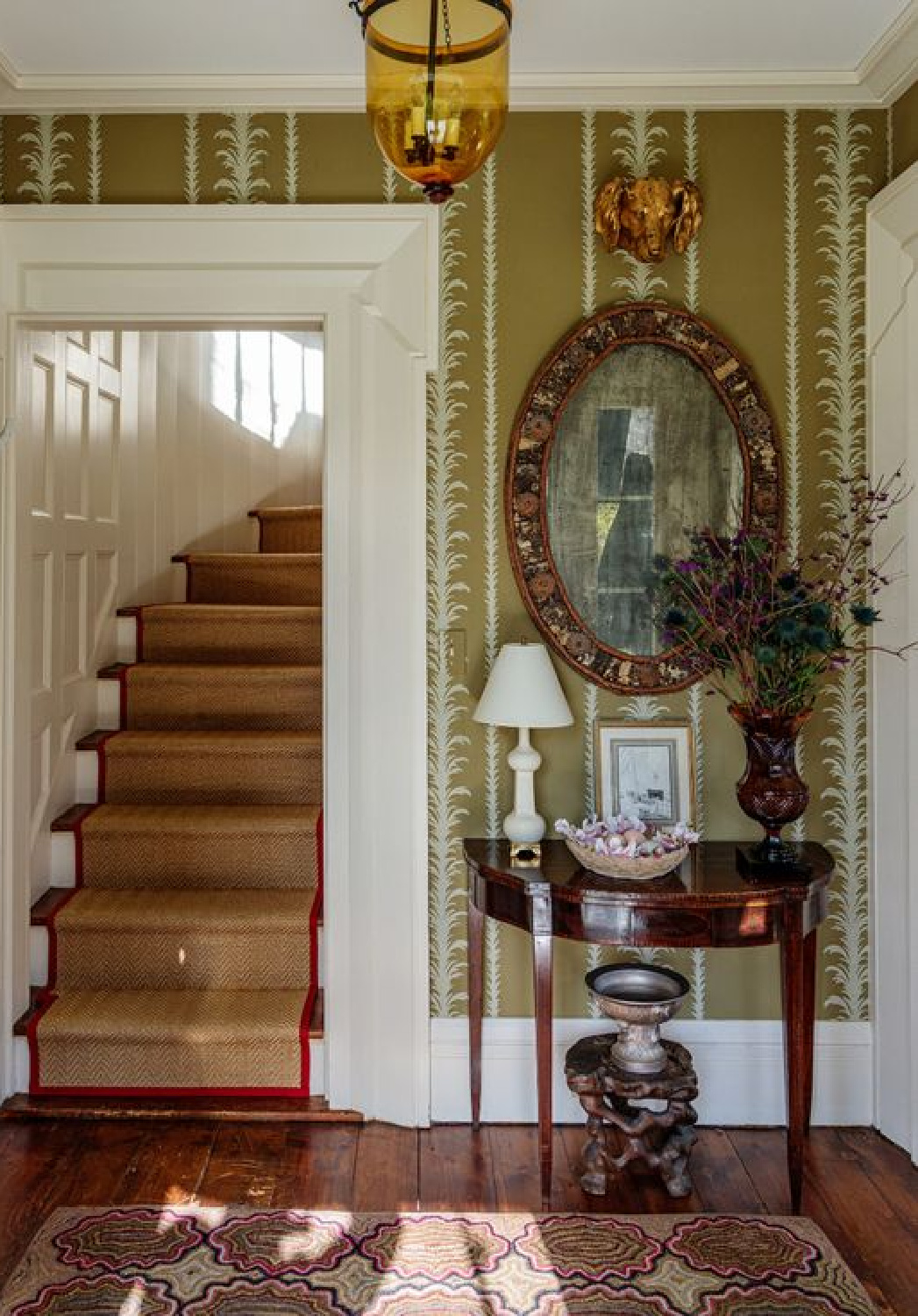 Beautiful entry with Cole & Sons wallpaper at Christopher Spitzmiller's Clove Brook Farm. #staircasedesign