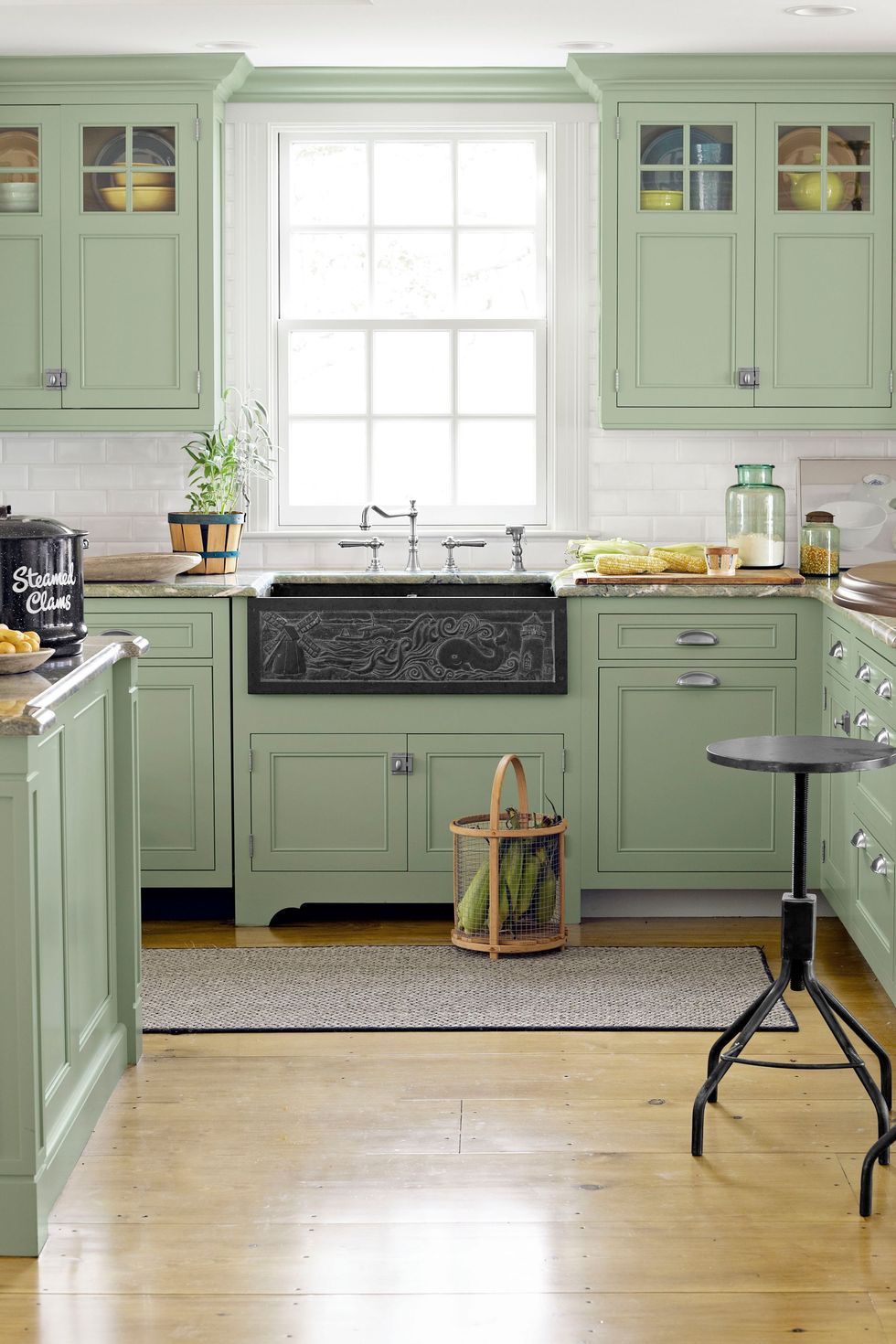 PPG Coastal Crush on green kitchen cabinets - photo by Miki Duesterhoff in Country Living. #ppgcoastalcrush #greenkitchens