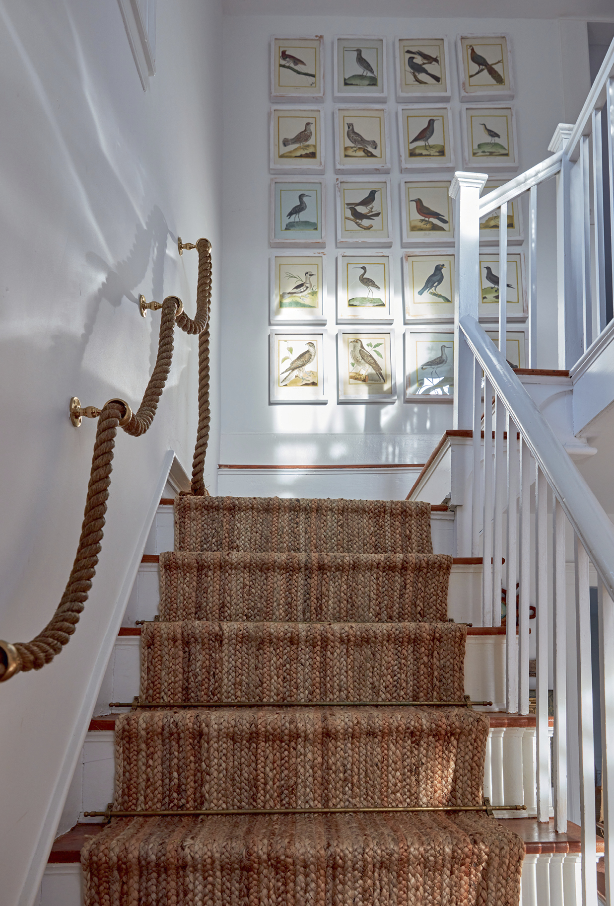 Coastal accents on stairs and bird prints in Nora Murphy COUNTRY HOUSE LIVING. #newenglandstyle #americancountry #americanfarmhouse