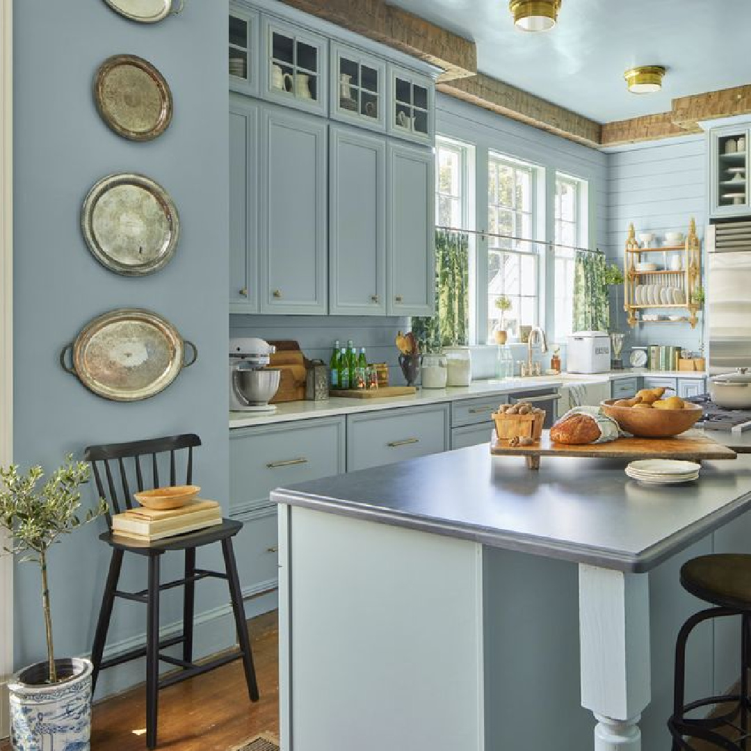 Sherwin-Williams DUTCH TILE BLUE in a beautiful blue country kitchen - Country Living (styling by Anna Logan and photo by Hector M. Sanchez).
