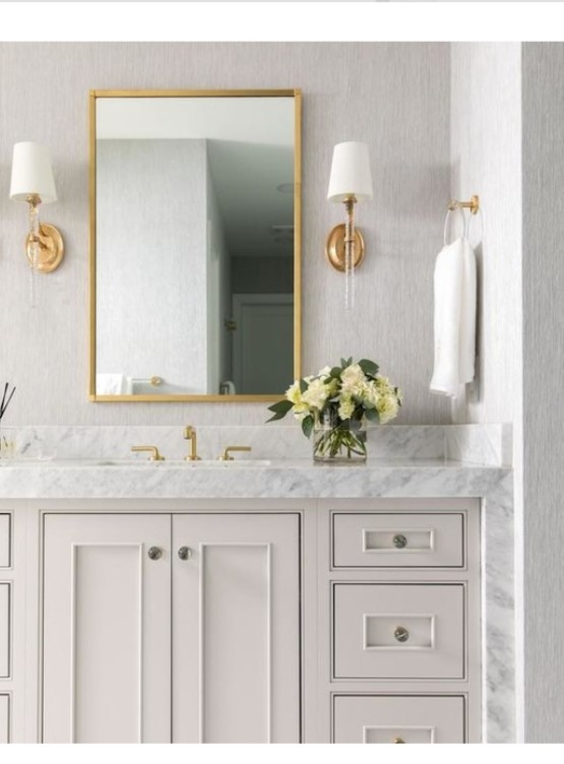 Abigail sconces (Marie Flanigan for Visual Comfort) in a lovely sophisticated traditional bathroom.