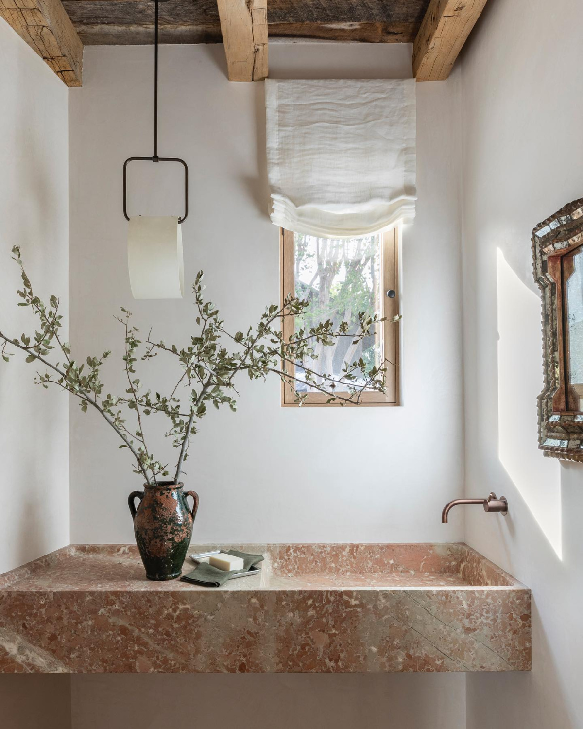 Belgian modern minimal bath with stone sink - Marie Flanigan design in a Lake Travis, TX home. Photo: Julie Soefer