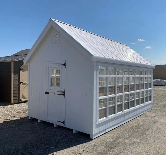 Greenhouse kit from Little Cottage Company. #greenhousekit #backyardshed #sheshedkit