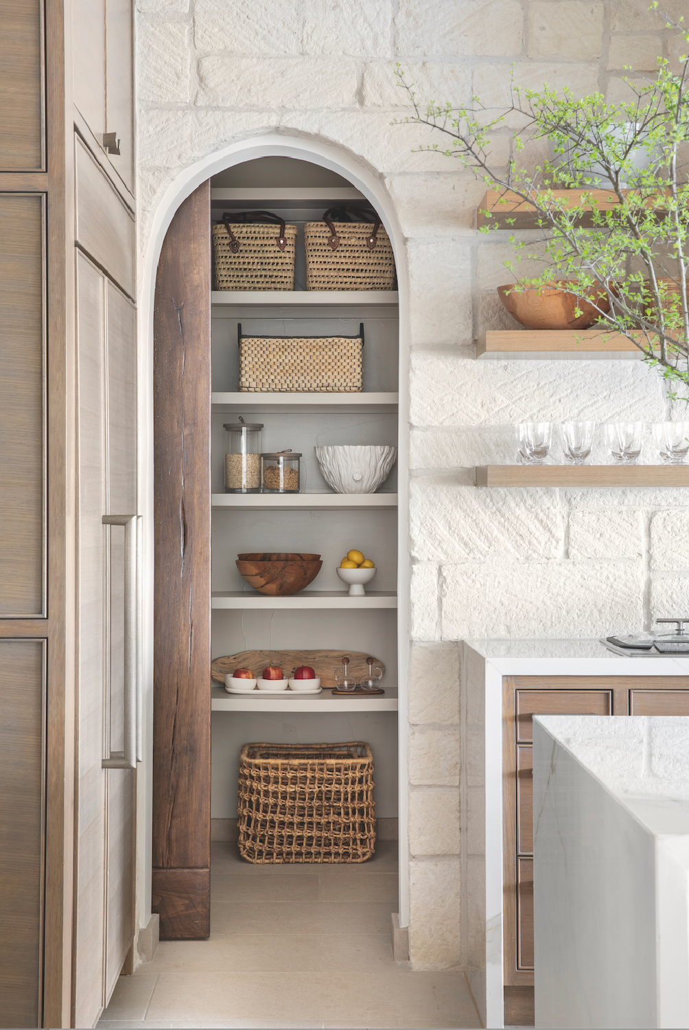 Timeless kitchen design with arched pantry in Marie Flanigan's THE BEAUTY OF HOME: Redefining Traditional Interiors (Gibbs Smith, 2020).