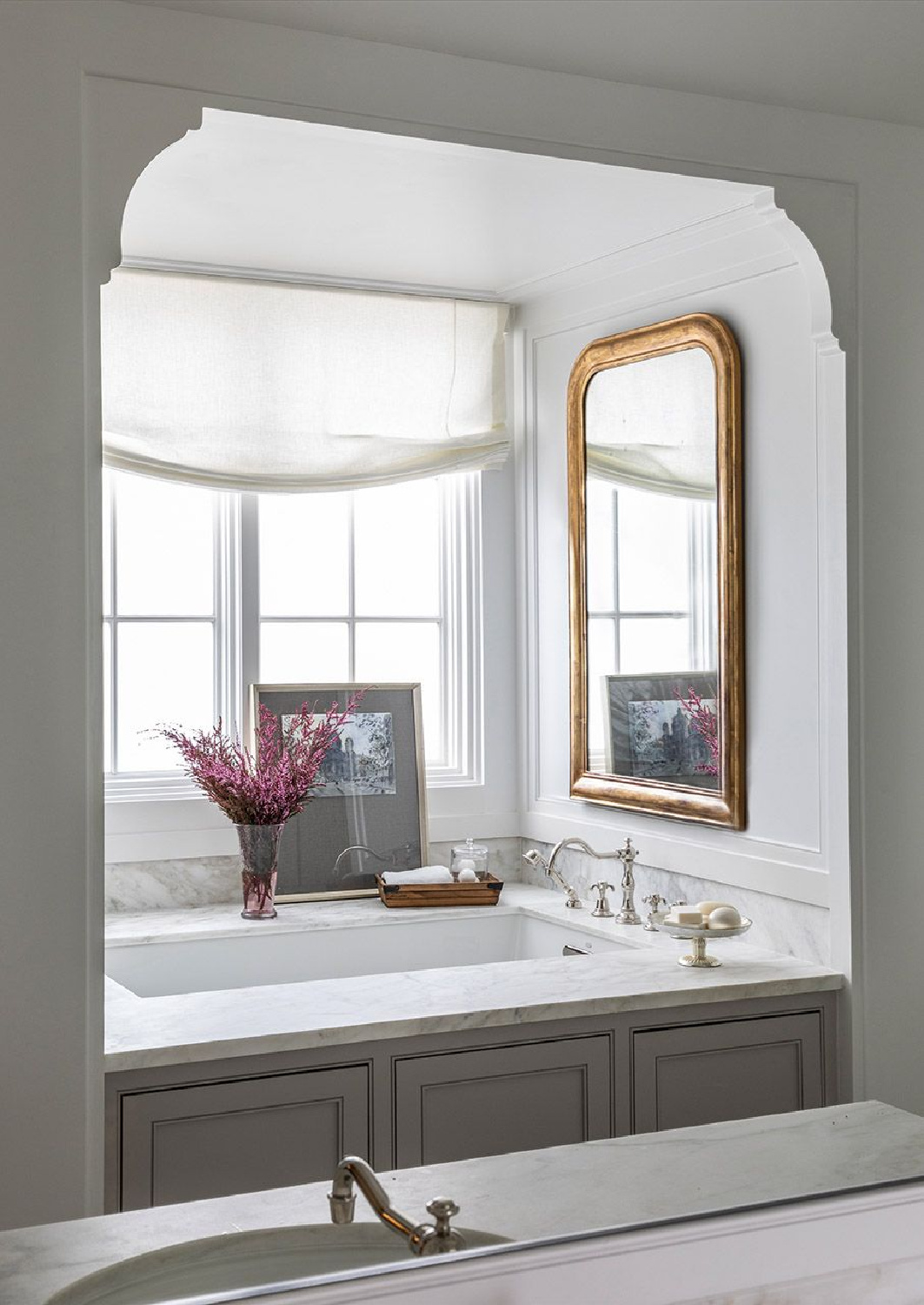 Luxurious and timeless bath in Marie Flanigan's THE BEAUTY OF HOME: Redefining Traditional Interiors (Gibbs Smith, 2020).