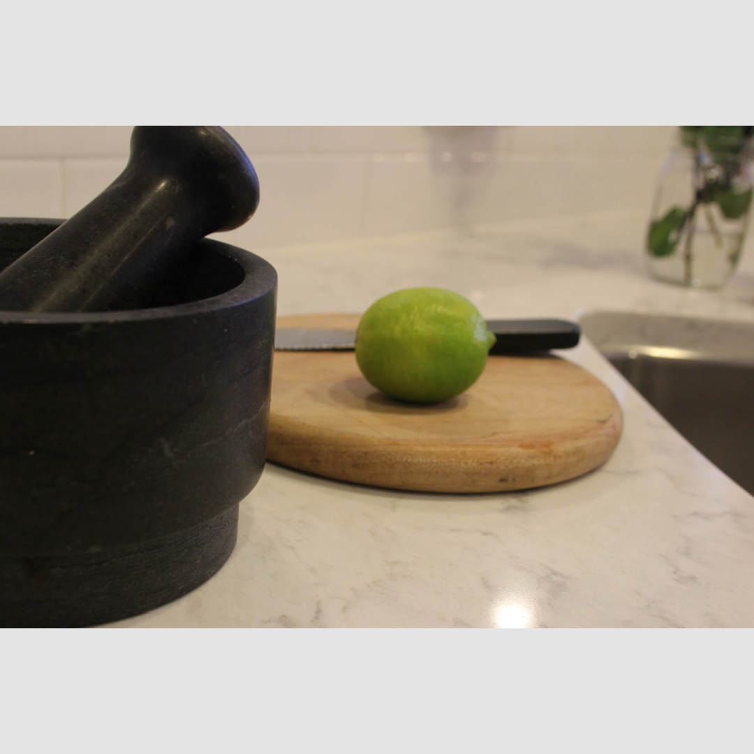 Minuet quartz (LXHausys Viatera) in a white Shaker kitchen - Hello Lovely. #whitequartzcountertop #minuetquartz