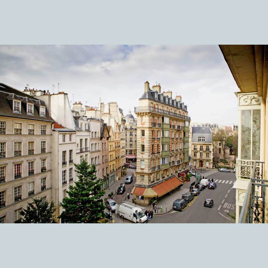 Hausmannian buildings and streetview from our balcony in a Paris apartment near Notre Dame - Hello Lovely Studio.