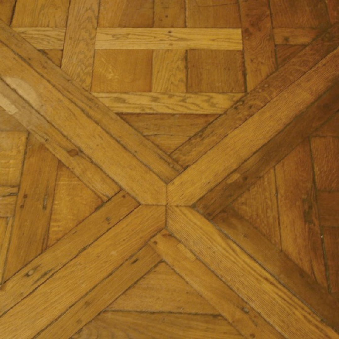 Herringbone wood floor pattern in a historical building in Paris - Hello Lovely Studio.