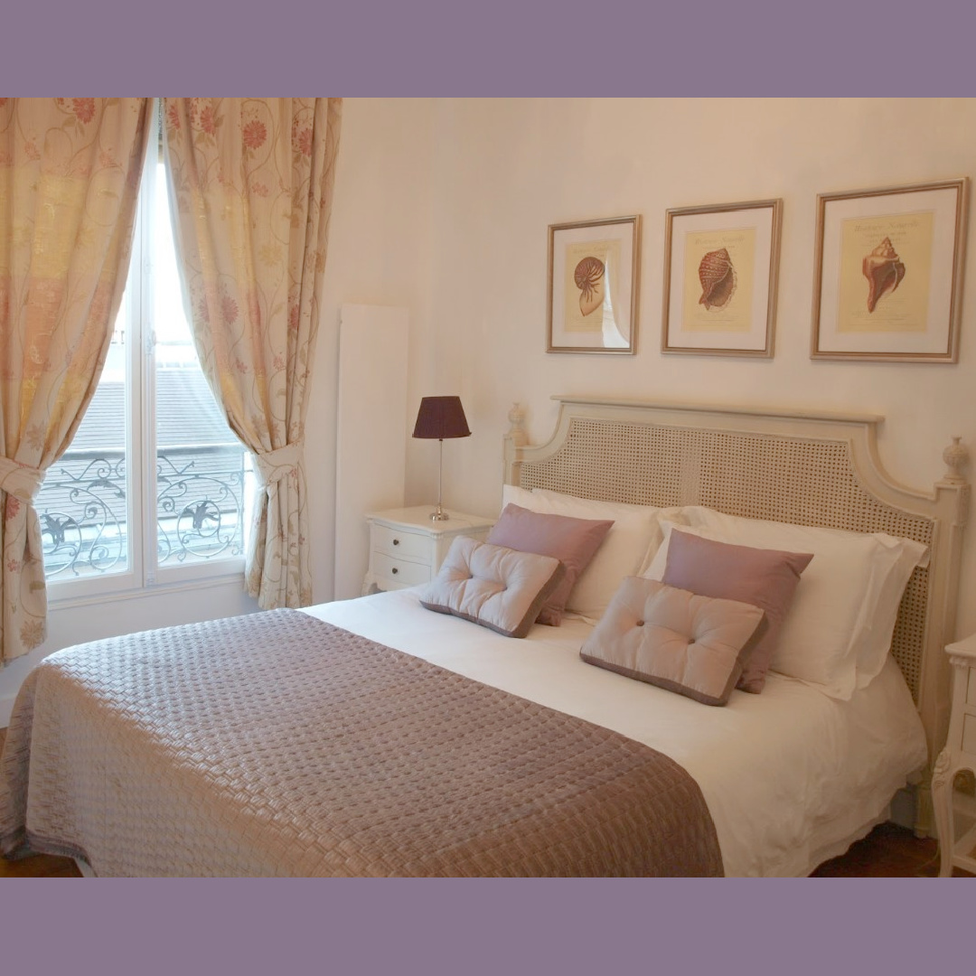 Paris apartment romantic bedroom decor with lavender accents and white walls - Hello Lovely Studio.