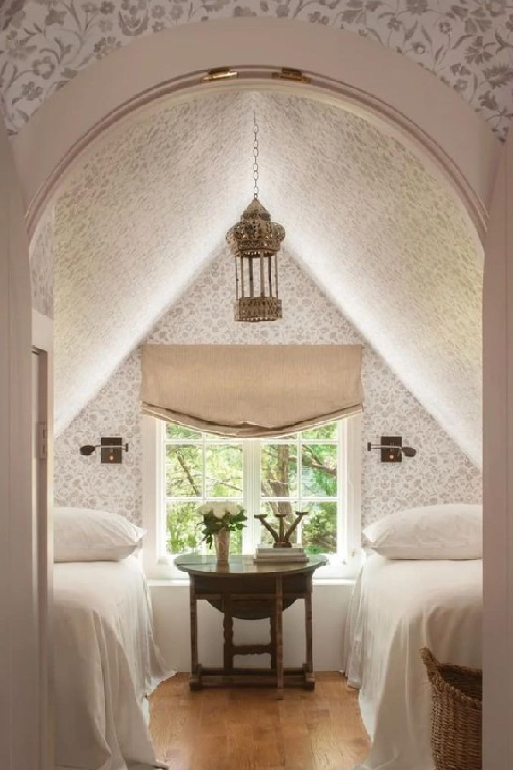 Attic bedroom with arched door. Timeless interior design by Shannon Bowers with nods to European antiques, patina, understated elegance, and sophisticated simplicity. #shannonbowers #timelessinteriors