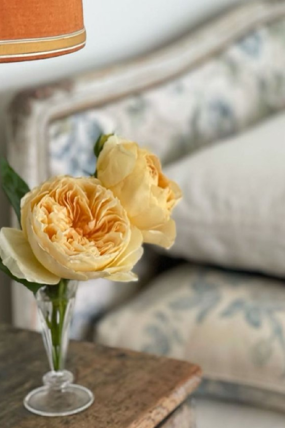 Roses on a bedside table. Timeless interior design by Shannon Bowers with nods to European antiques, patina, understated elegance, and sophisticated simplicity. #shannonbowers #timelessinteriors