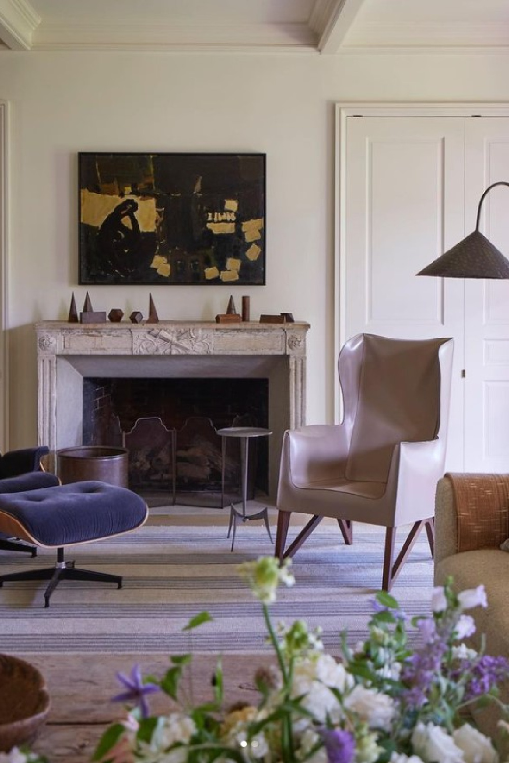 Living room with antique French fireplace. Timeless interior design by Shannon Bowers with nods to European antiques, patina, understated elegance, and sophisticated simplicity. #shannonbowers #timelessinteriors