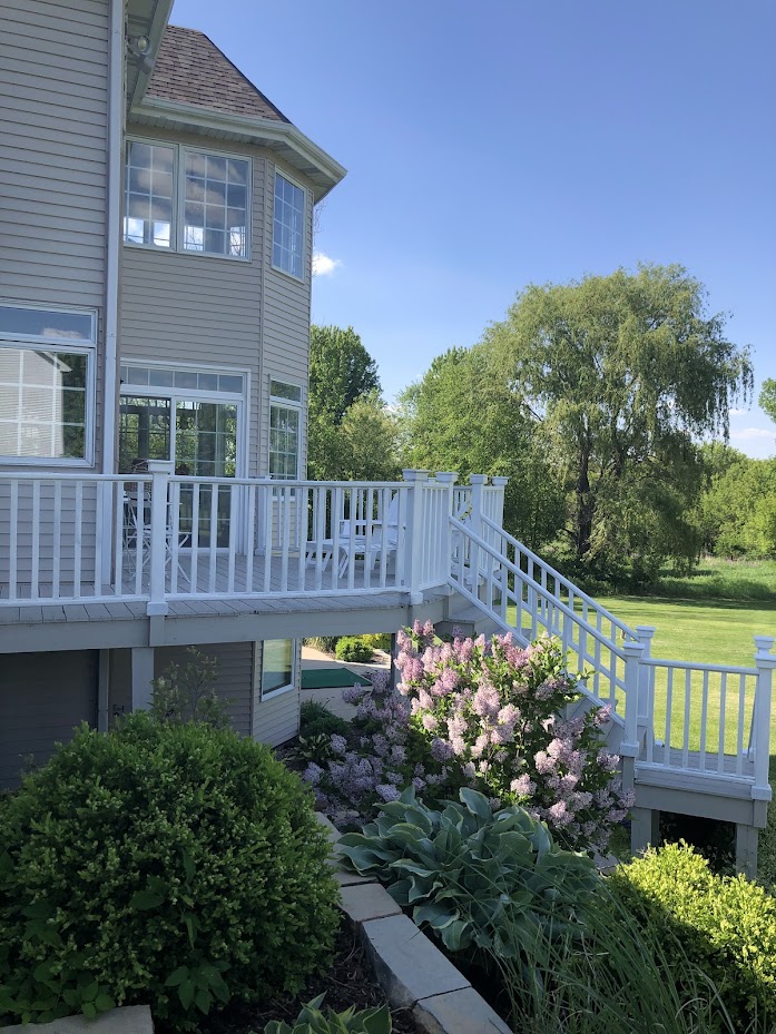 Backyard, deck, and gardens at the Georgian in Spring - Hello Lovely Studio.