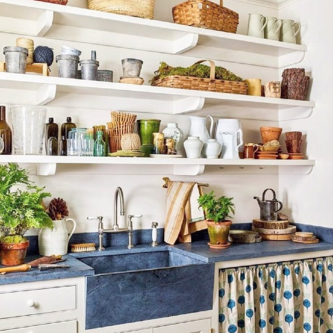 Blue farm sink in a lovely rustic garden room - @gpschaefer in @archdigest.