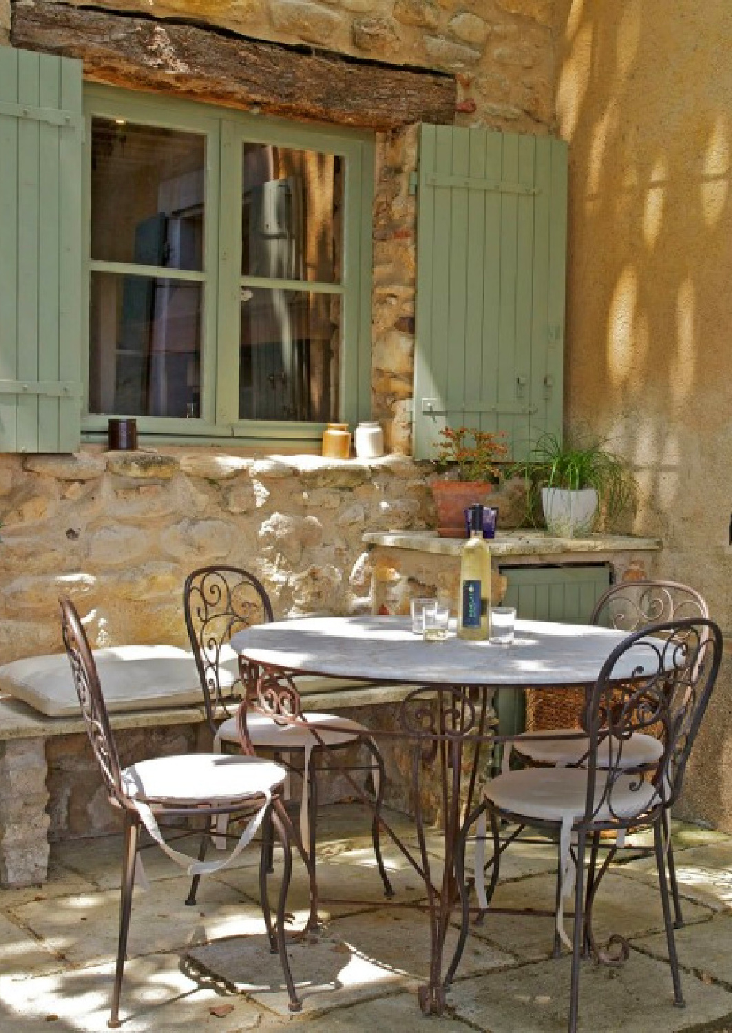 French green shutters on a charming Provence farmhouse with Old World style gardens and interiors - Bonnieux Villa (Your Haven in Paris).