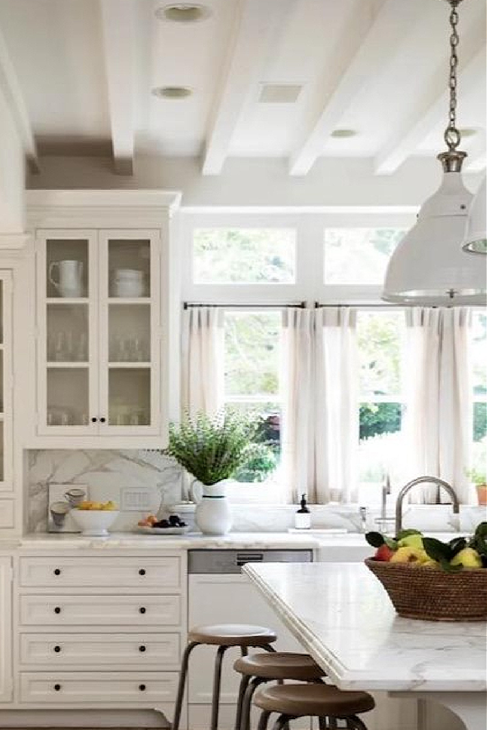 Nancy Meyers own classic white traditional kitchen in her renovated home in LA - Architectural Digest. #nancymeyerskitchen
