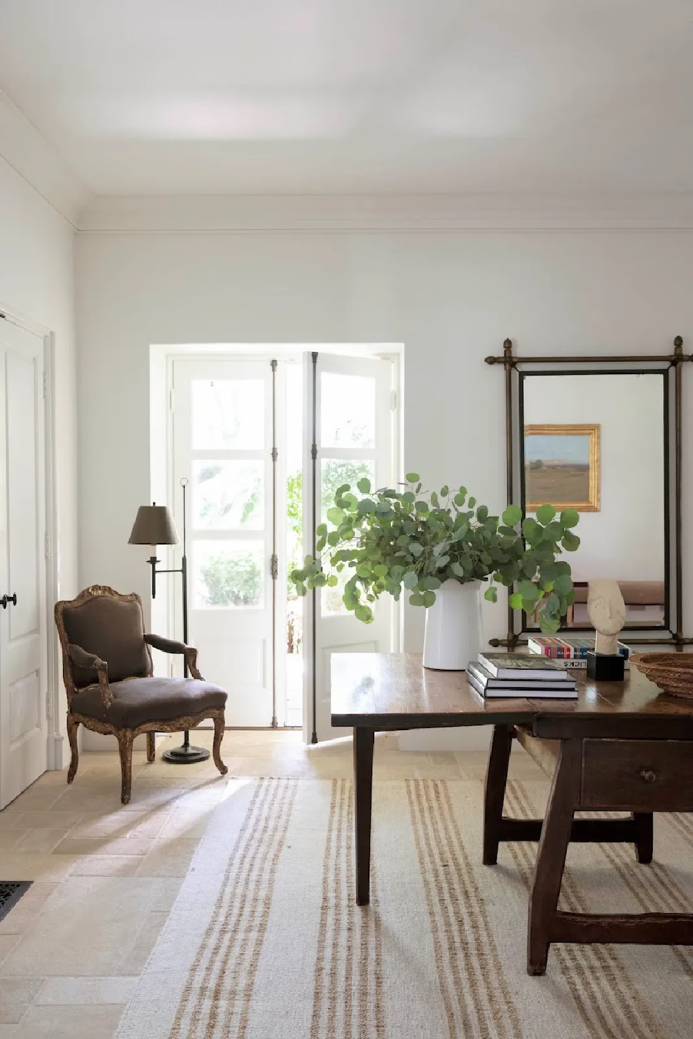 Entry with Rose Tarlow antique table in director Nancy Meyers own home in LA in Architectural Digest. #nancymeyersinteriors #nancymeyersaesthetic