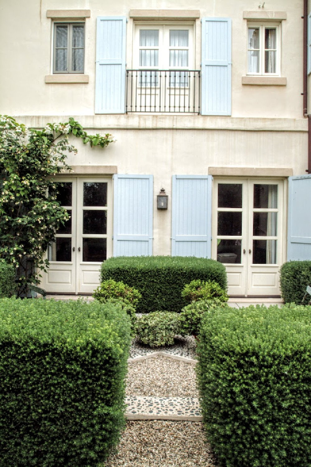 Nancy Meyers Provencal home in Los Angeles before renovation with its blue shutters.