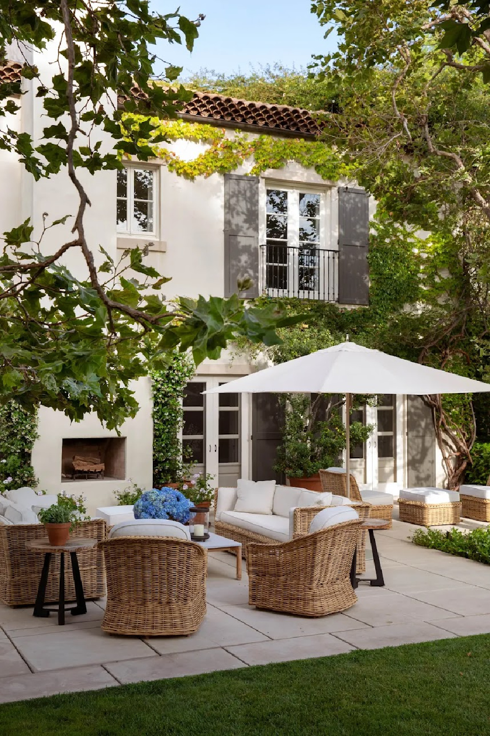 Nancy Meyers Provencal home in Los Angeles after renovation with its gray shutters. #nancymeyers