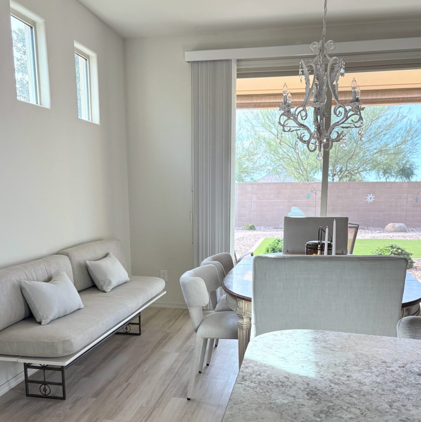 Dining area with banquette seating in our snowbird house in Arizona - Hello Lovely Studio.