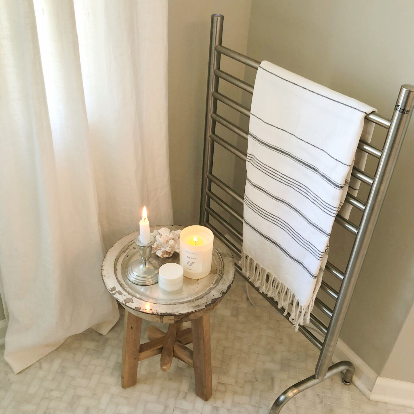 Towel warmer (Amba's Solo 24" Freestanding in Brushed) in Hello Lovely's bath. #towelwarmers